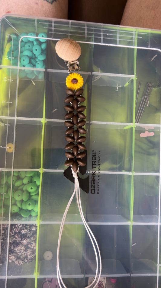 Brown sunflower pacifier clip