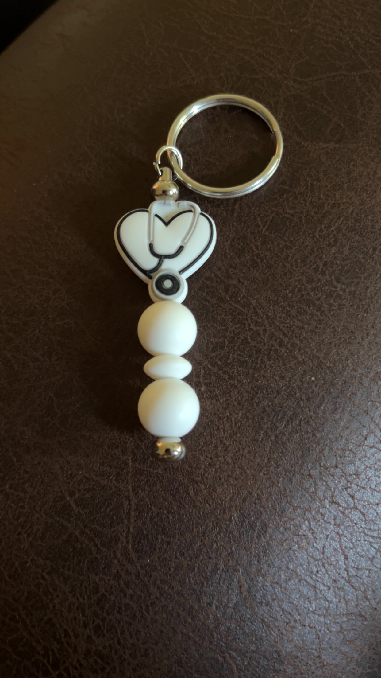 White stethoscope heart keychain bar
