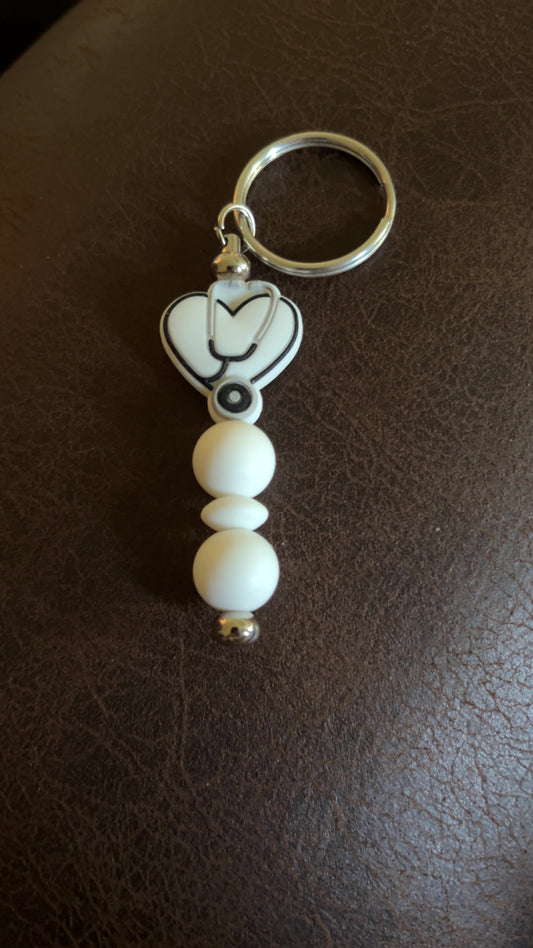 White stethoscope heart keychain bar